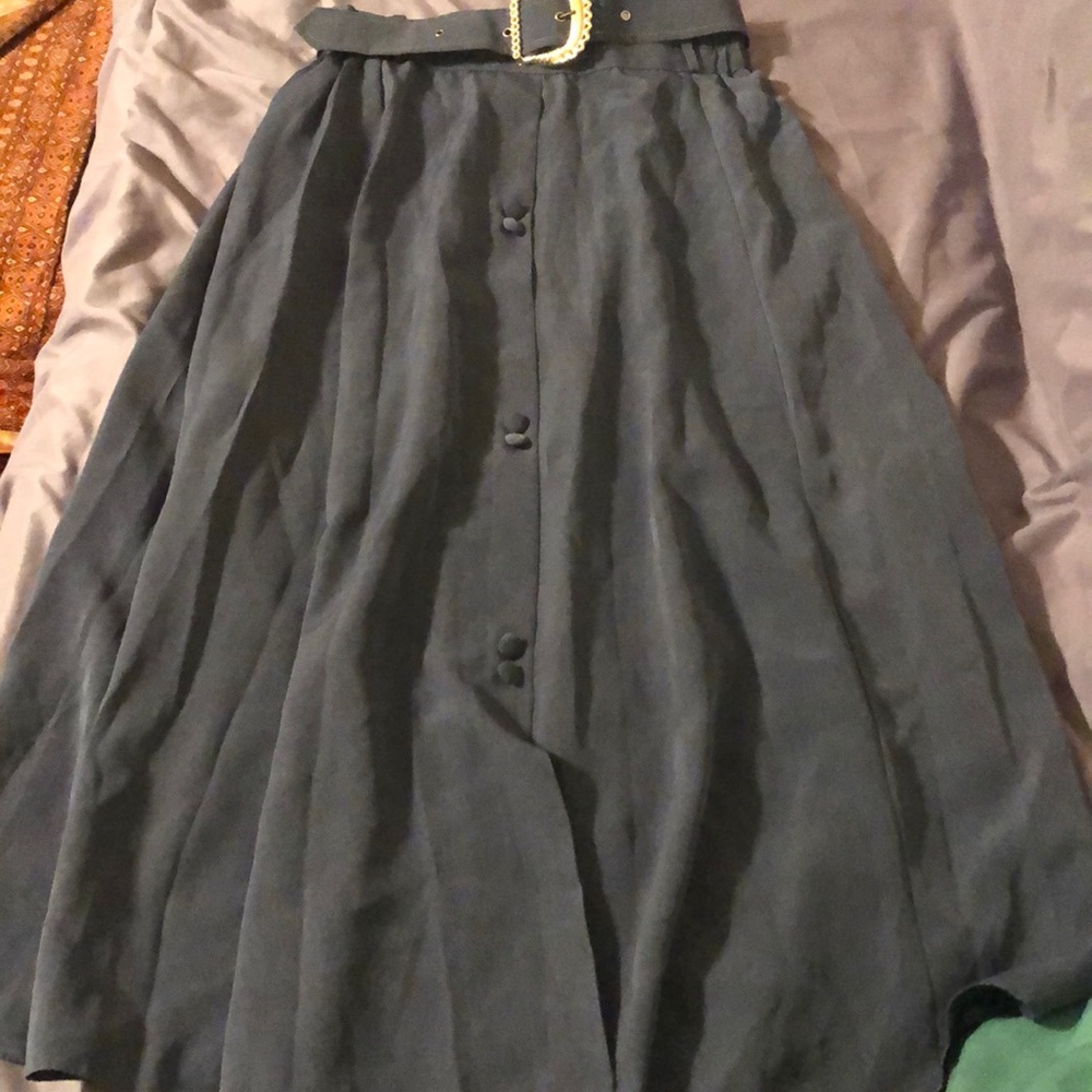 Long skirt dark blue.